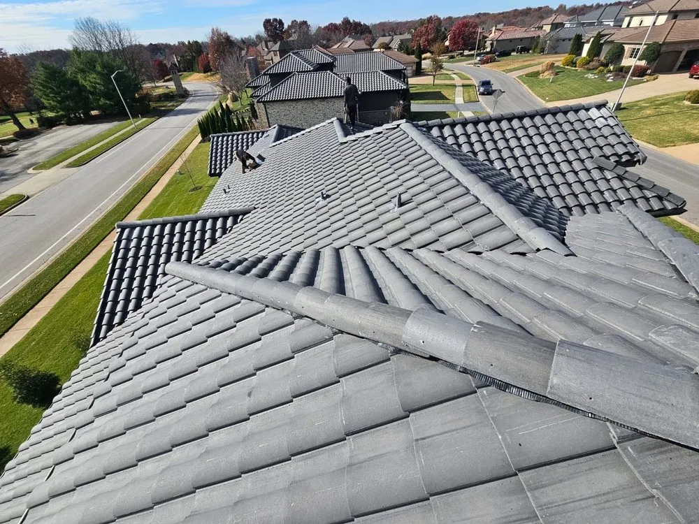 Slide of Elite Midnight Roofing