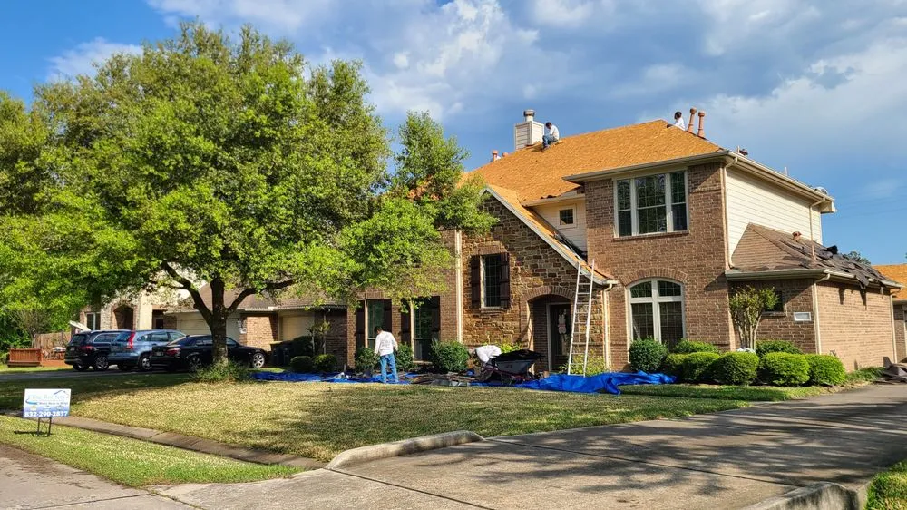 Slide of Elite Roofers