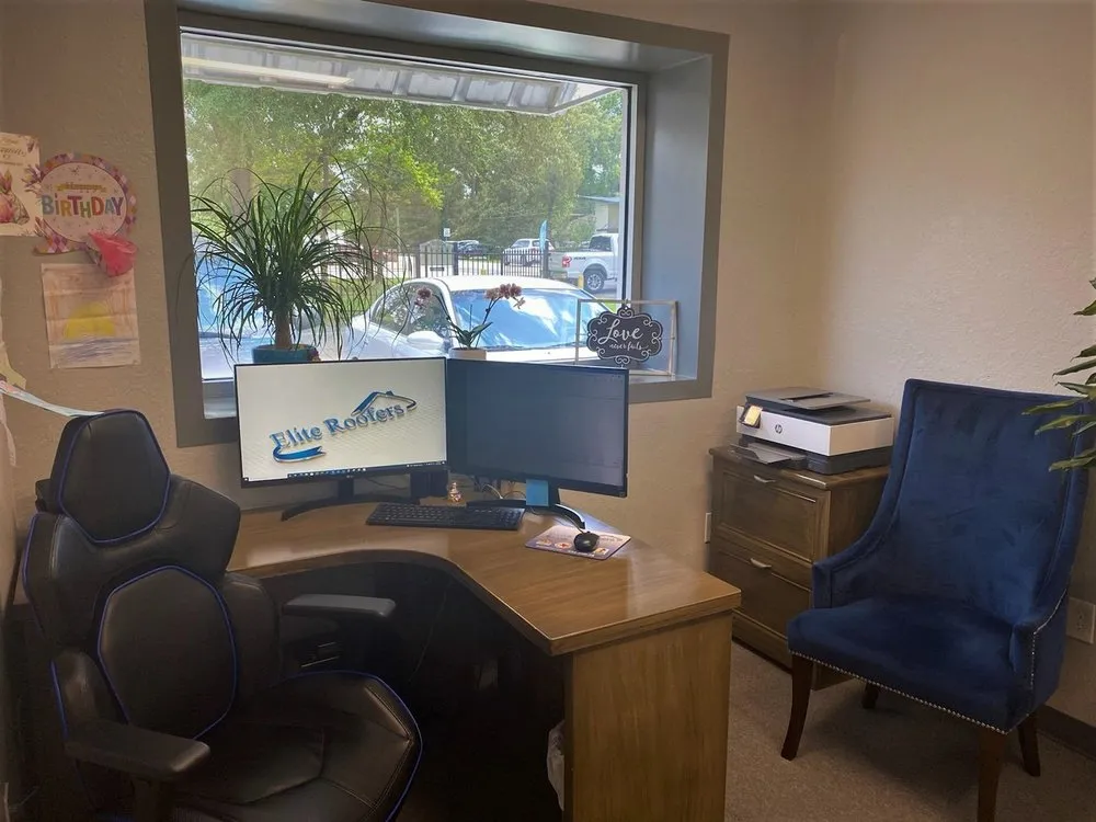 Slide of Elite Roofers