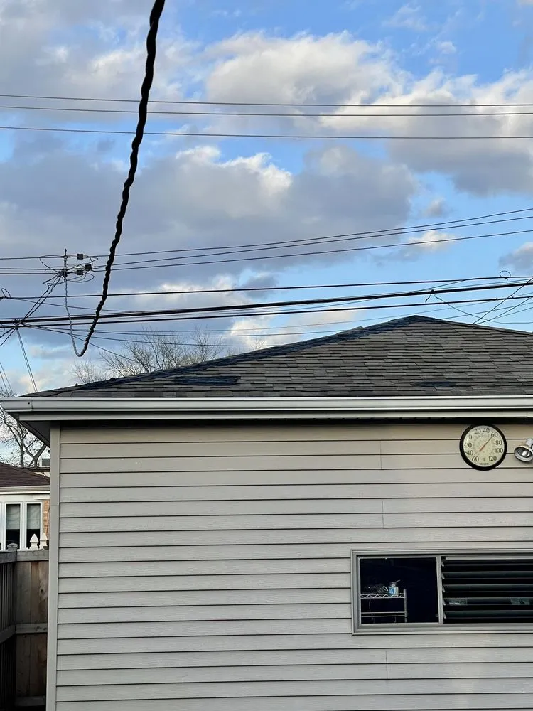 Slide of Elite Roofing & Construction