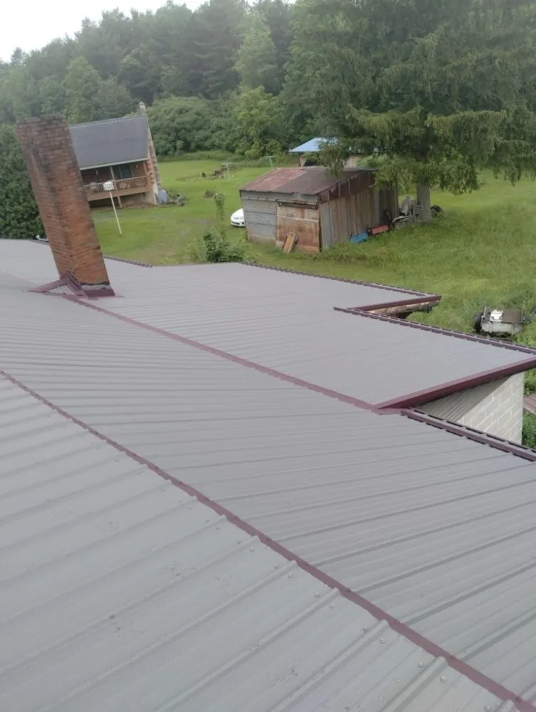 Slide of Elite Roofing & Construction