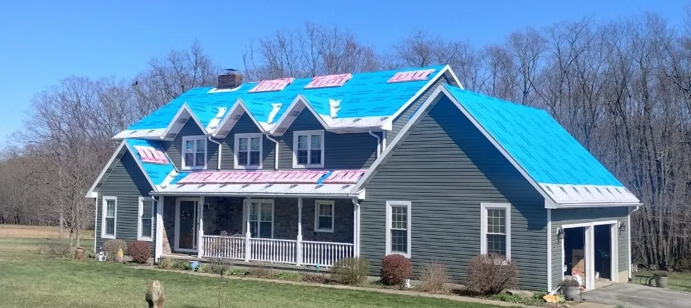 Slide of Elite Roofing & Construction