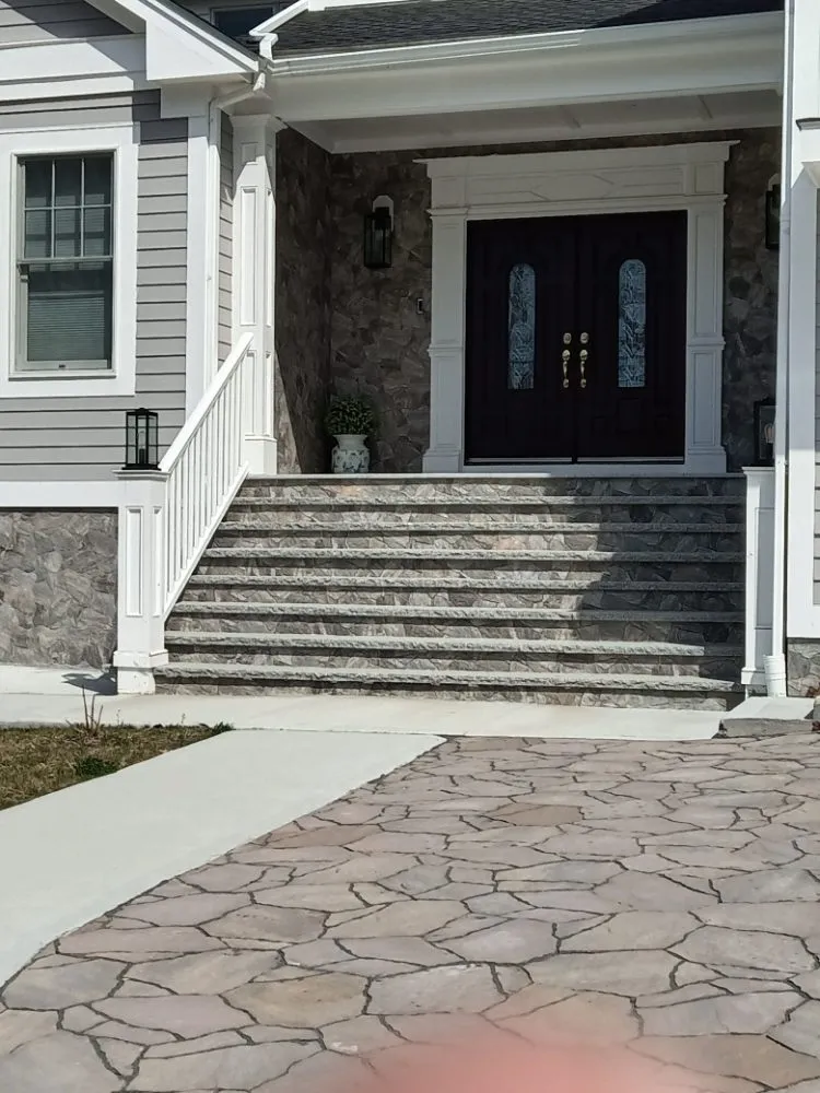 Slide of Elite Roofing & Masonry