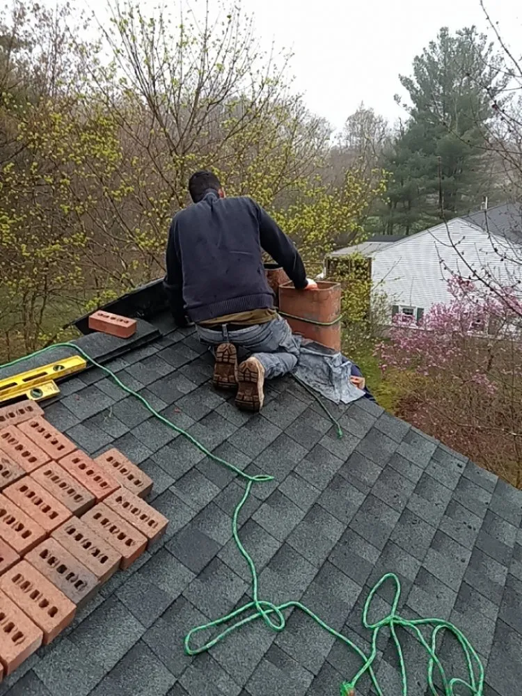 Slide of Elite Roofing & Masonry