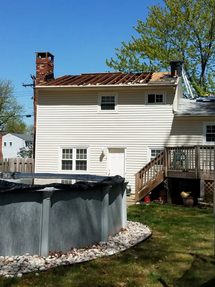 Slide of Elite Roofing & Restoration