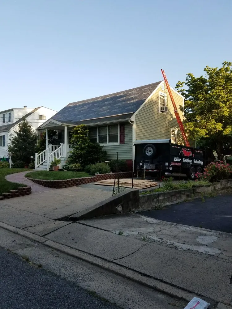 Slide of Elite Roofing & Restoration