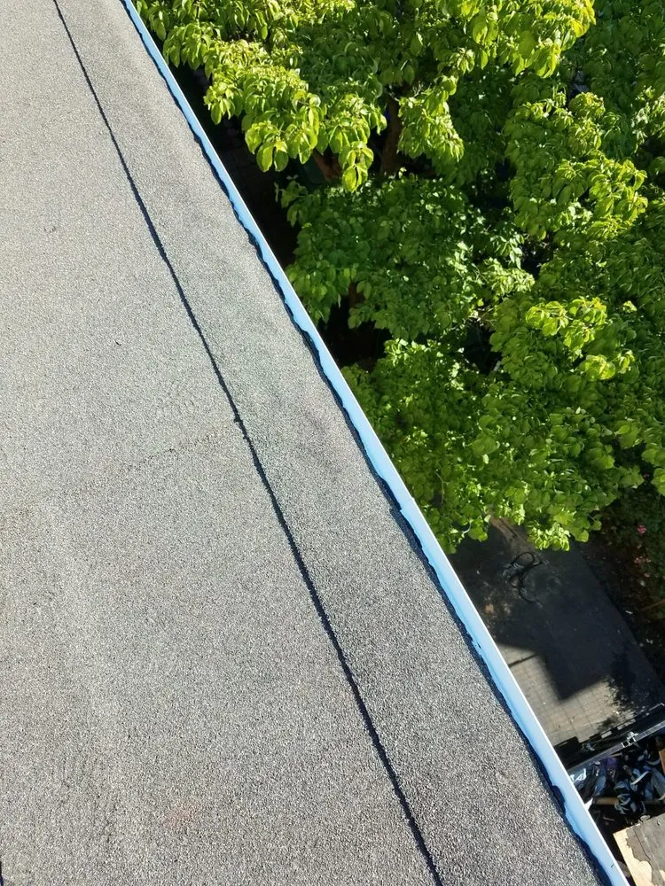 Slide of Elite Roofing & Restoration