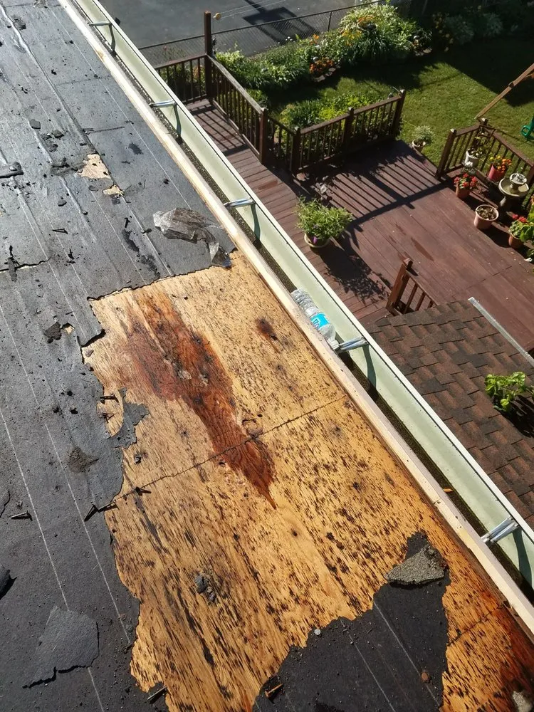 Slide of Elite Roofing & Restoration