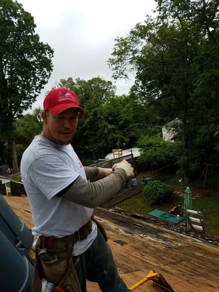 Slide of Elite Roofing & Restoration