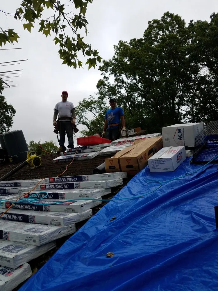 Slide of Elite Roofing & Restoration