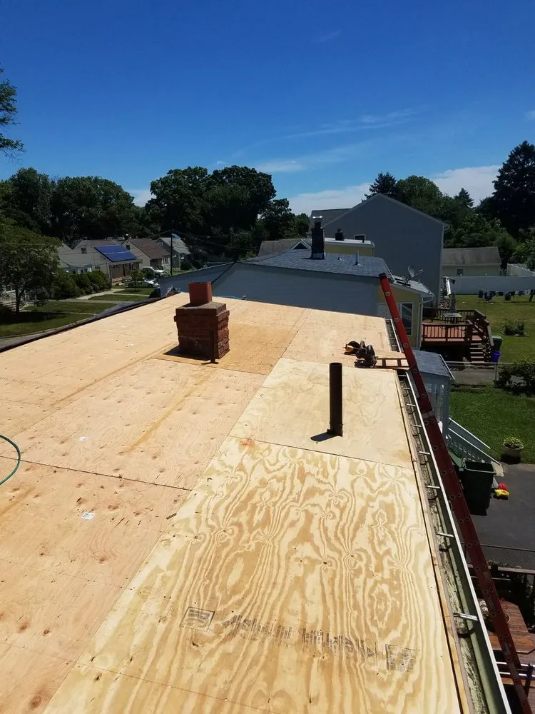 Slide of Elite Roofing & Restoration