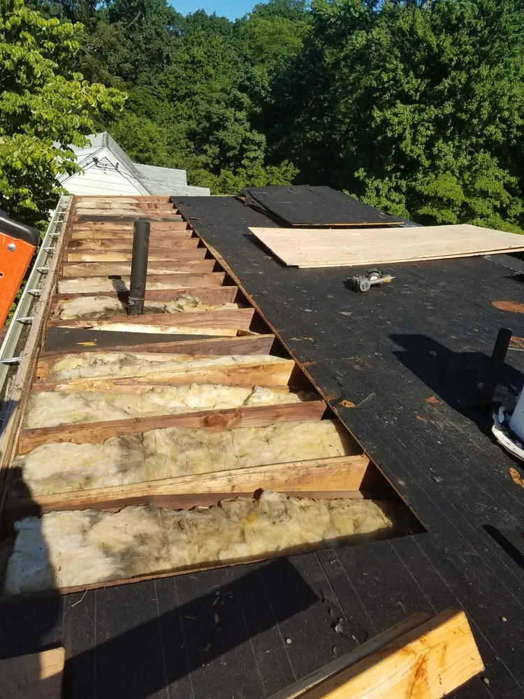 Slide of Elite Roofing & Restoration