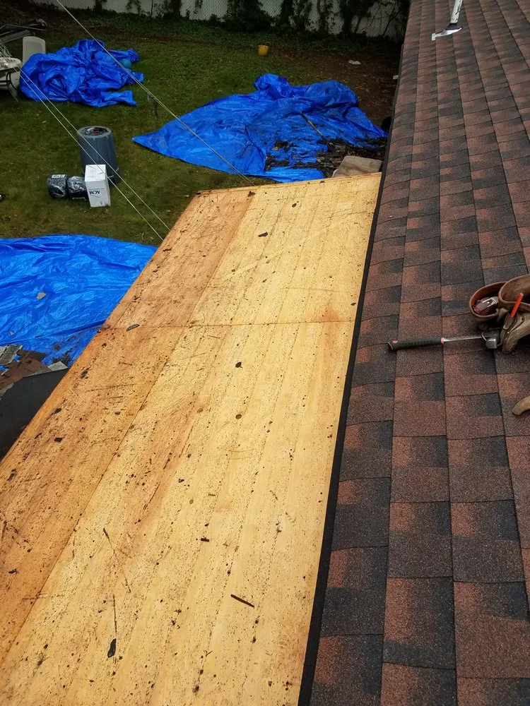 Slide of Elite Roofing & Restoration