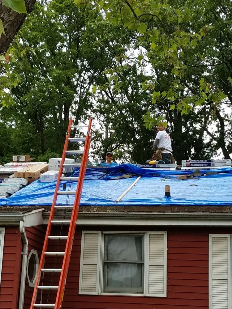 Slide of Elite Roofing & Restoration