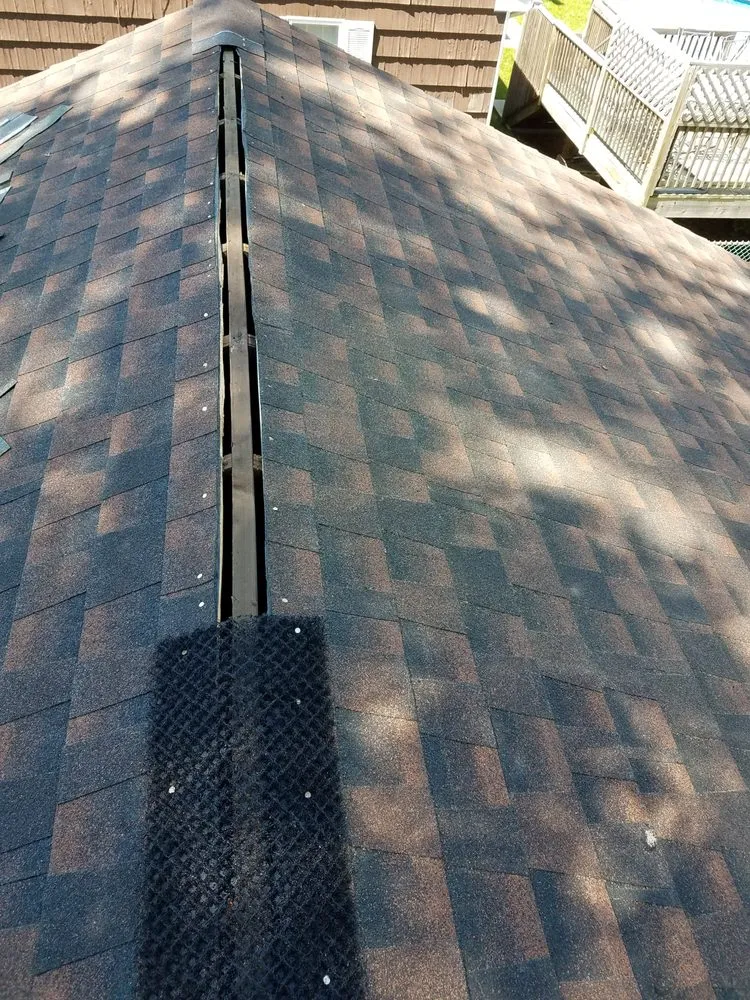 Slide of Elite Roofing & Restoration