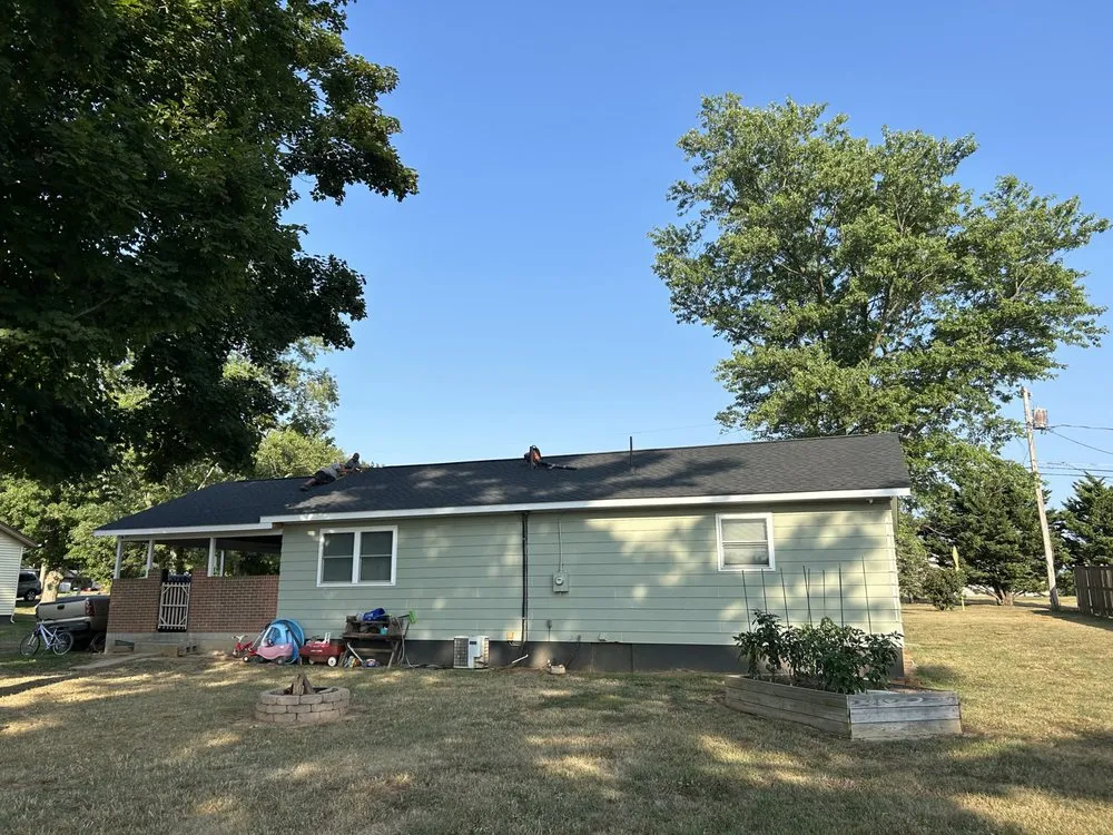 Slide of Elite Roofing & Restoration