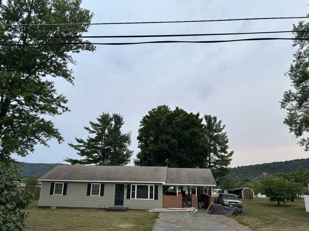 Slide of Elite Roofing & Restoration