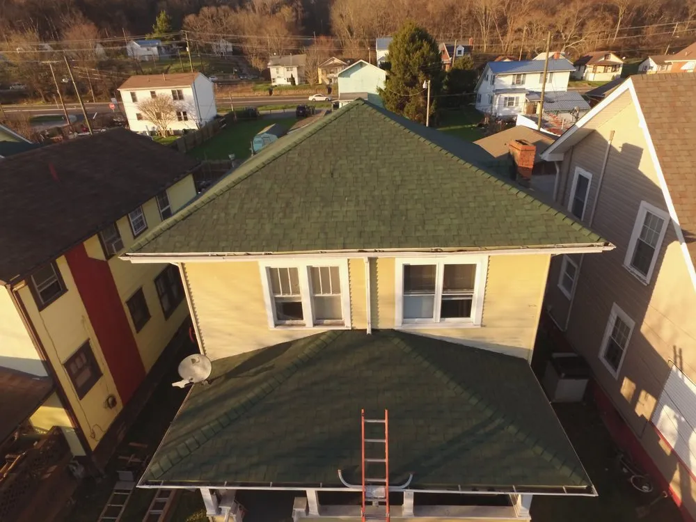 Slide of Elite Roofing