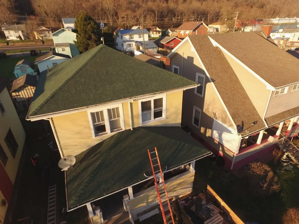 Slide of Elite Roofing