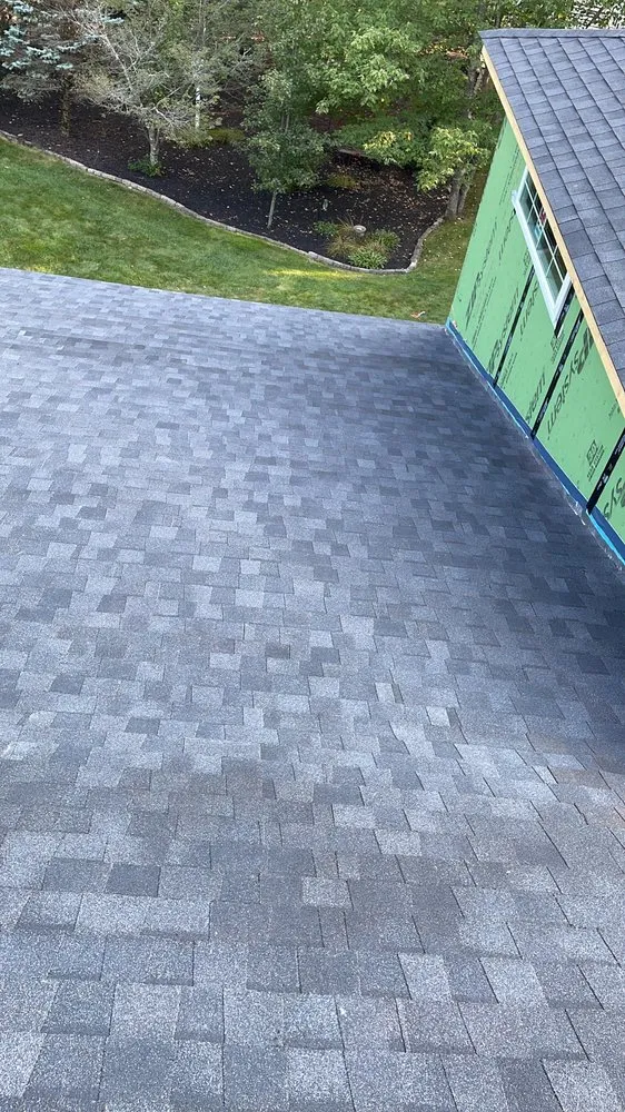 Slide of Elite Roofing Construction