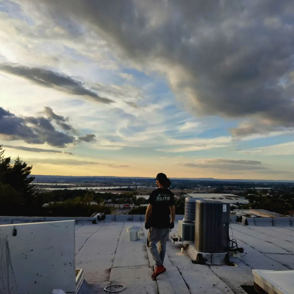 Slide of Elite Roofing Contractor