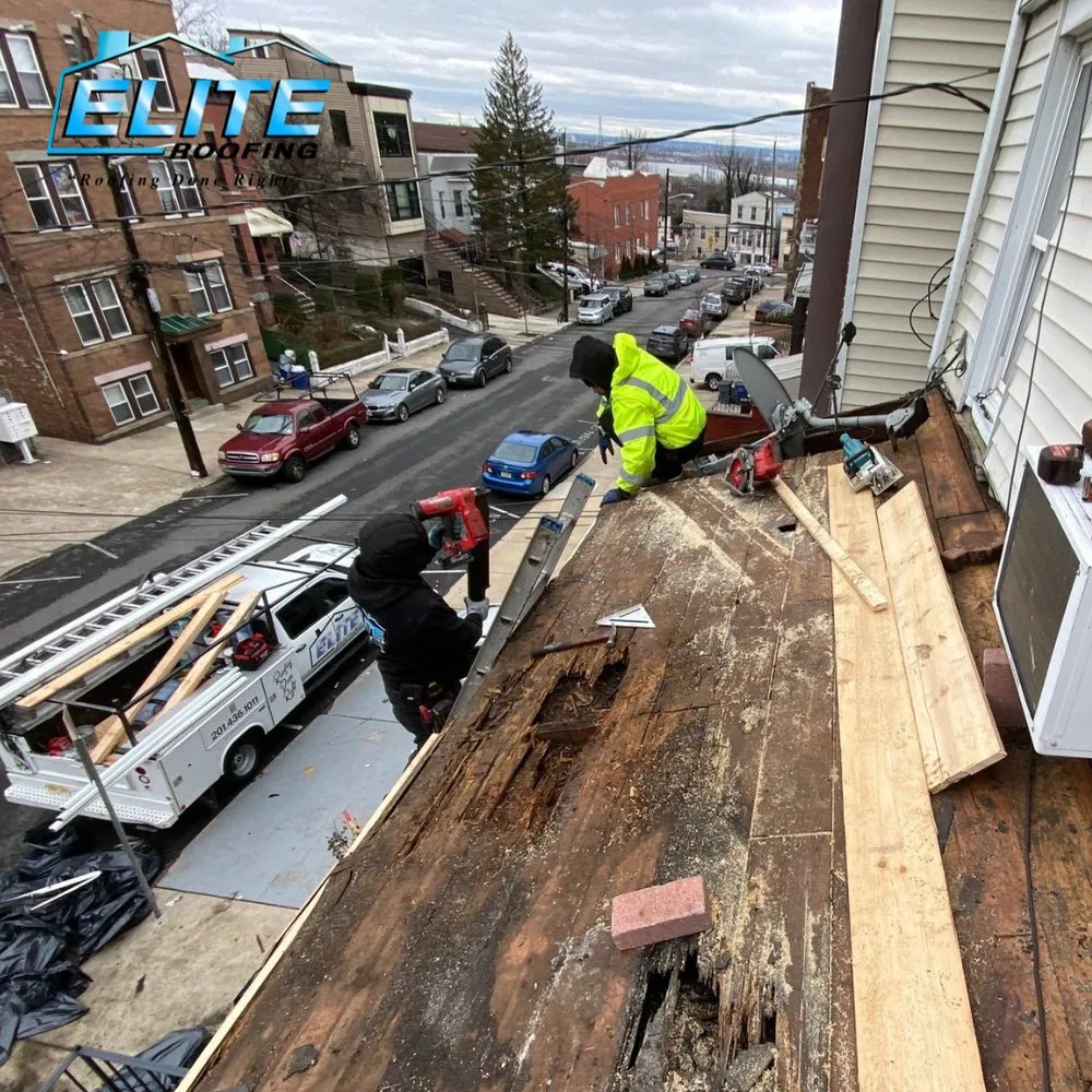 Slide of Elite Roofing Contractor