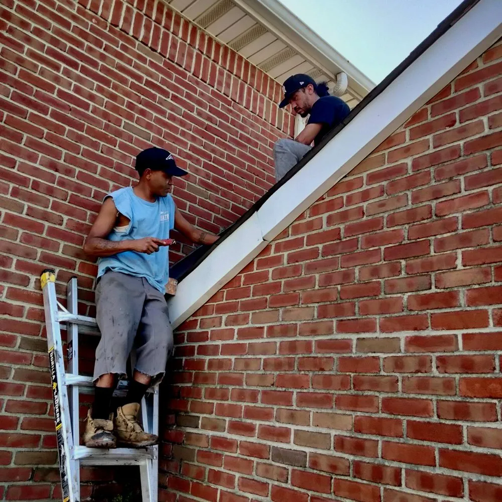 Slide of Elite Roofing Contractor