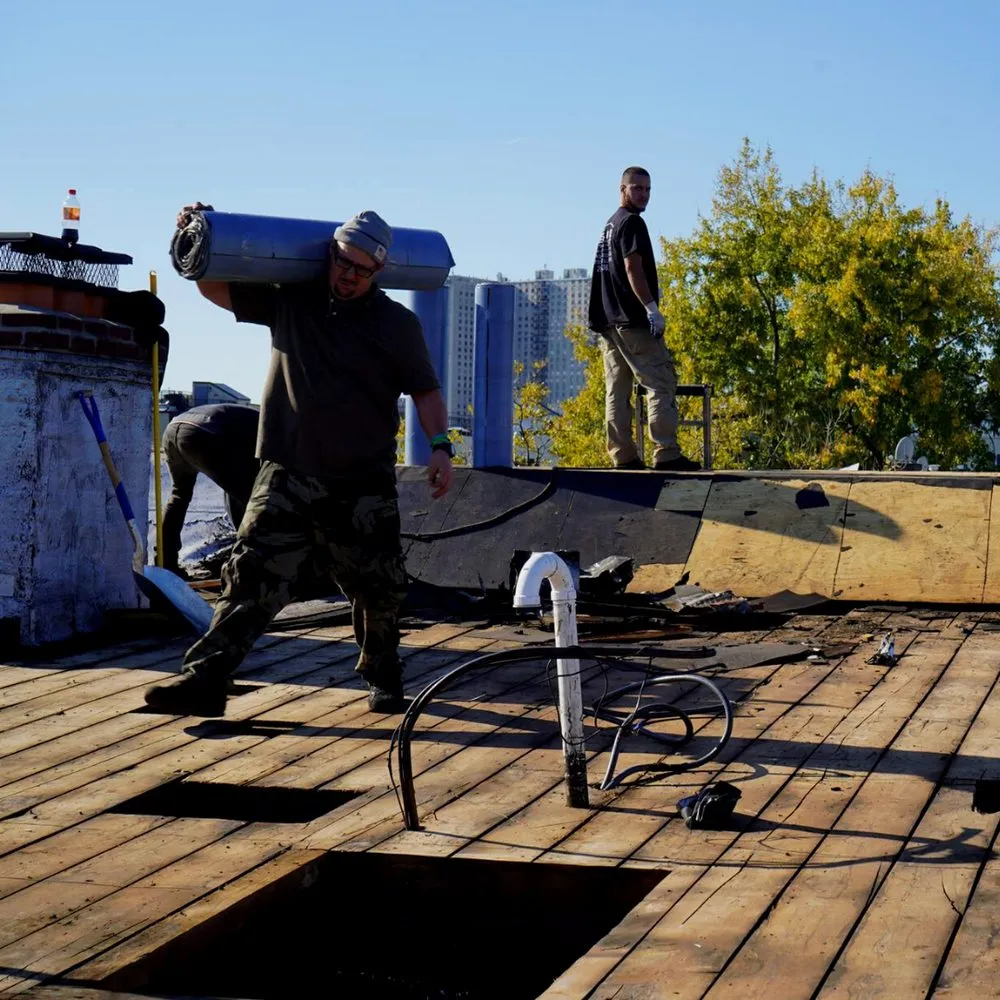 Slide of Elite Roofing Contractor