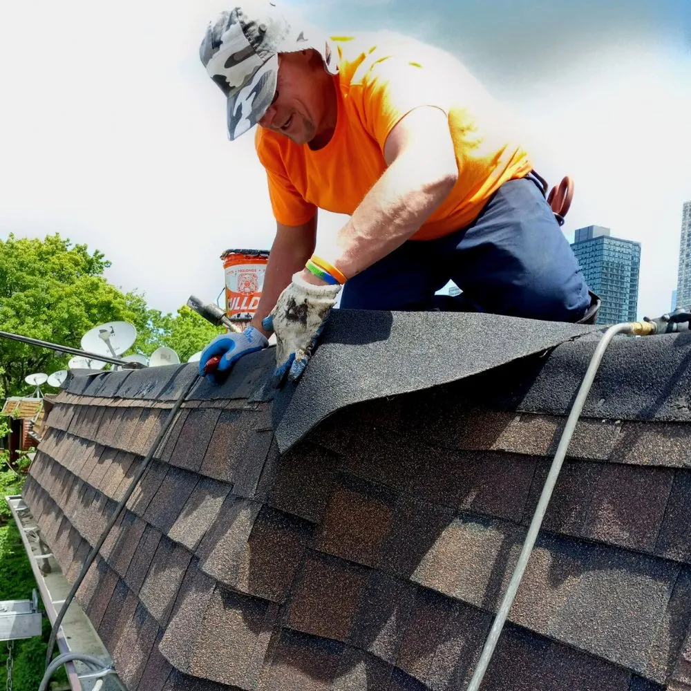 Slide of Elite Roofing Contractor