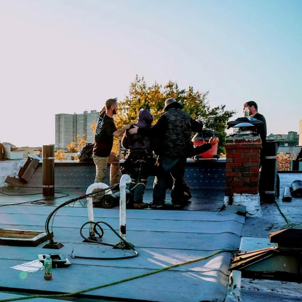 Slide of Elite Roofing Contractor