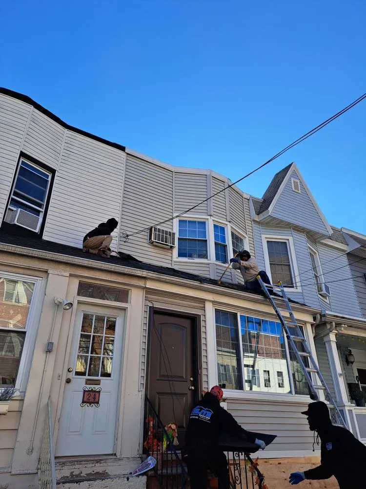 Slide of Elite Roofing Contractor