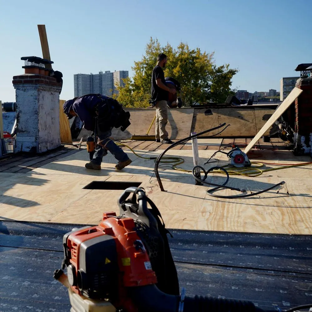 Slide of Elite Roofing Contractor