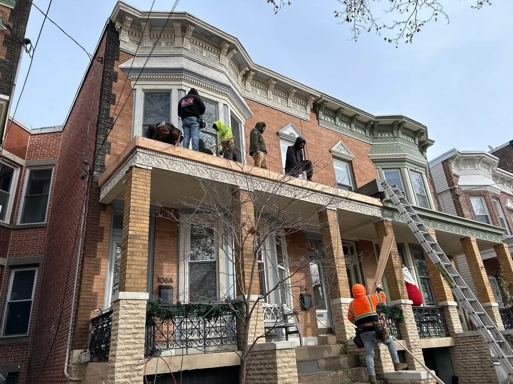 Slide of Elite Roofing Contractor