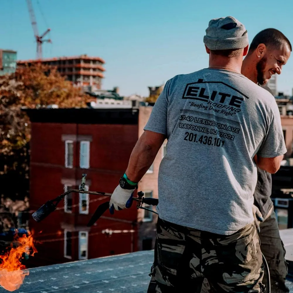 Slide of Elite Roofing Contractor