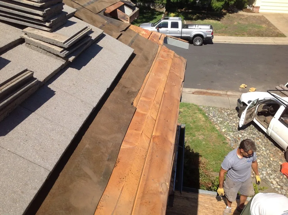 Slide of Elite Roofing