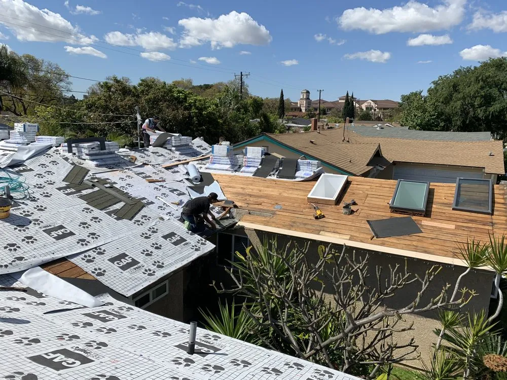 Slide of Elite Roofing Solutions