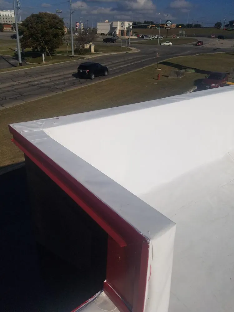 Slide of Elite Roofing Solutions