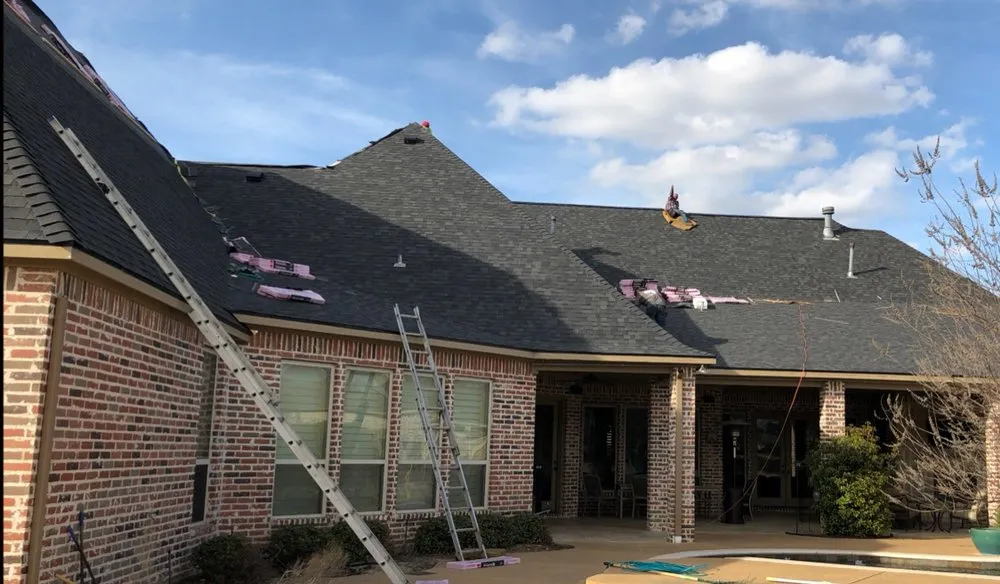 Slide of Elite Roofing