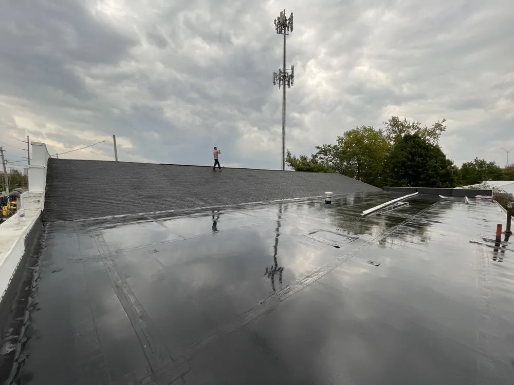 Slide of Elite Shield Roofing