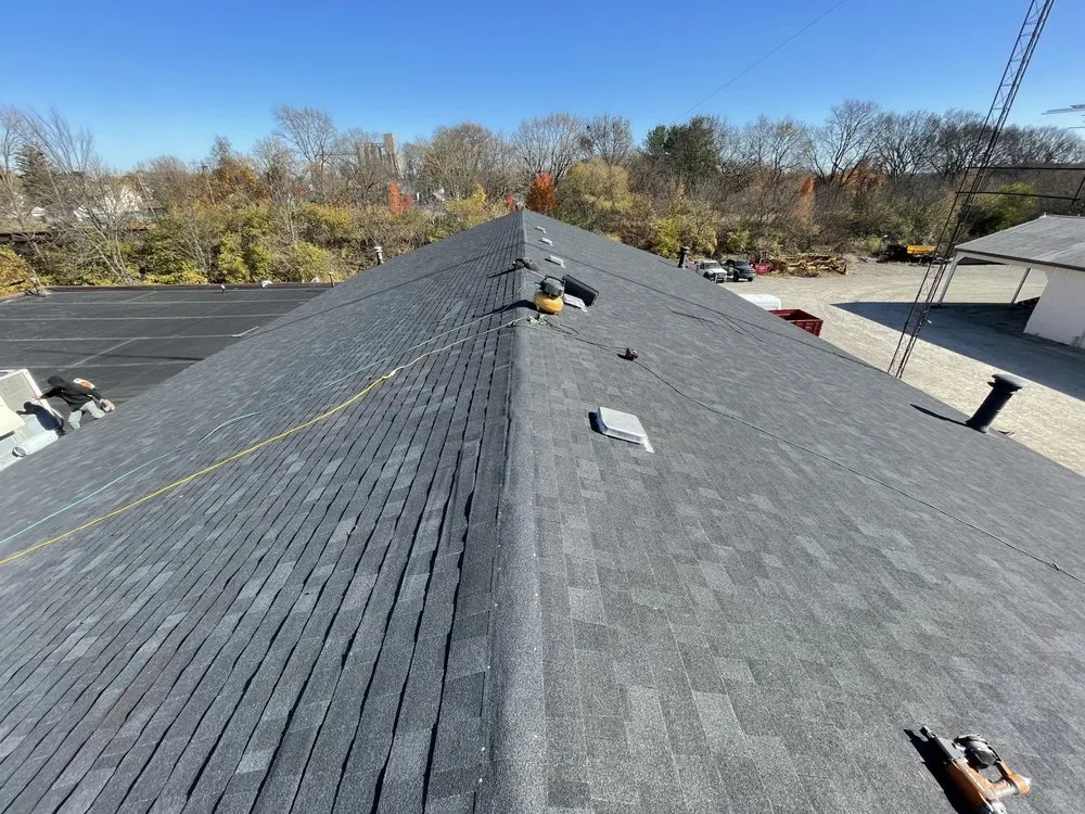 Slide of Elite Shield Roofing