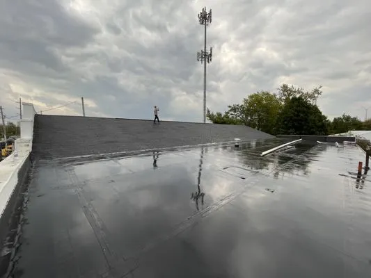 Elite Shield Roofing Logo