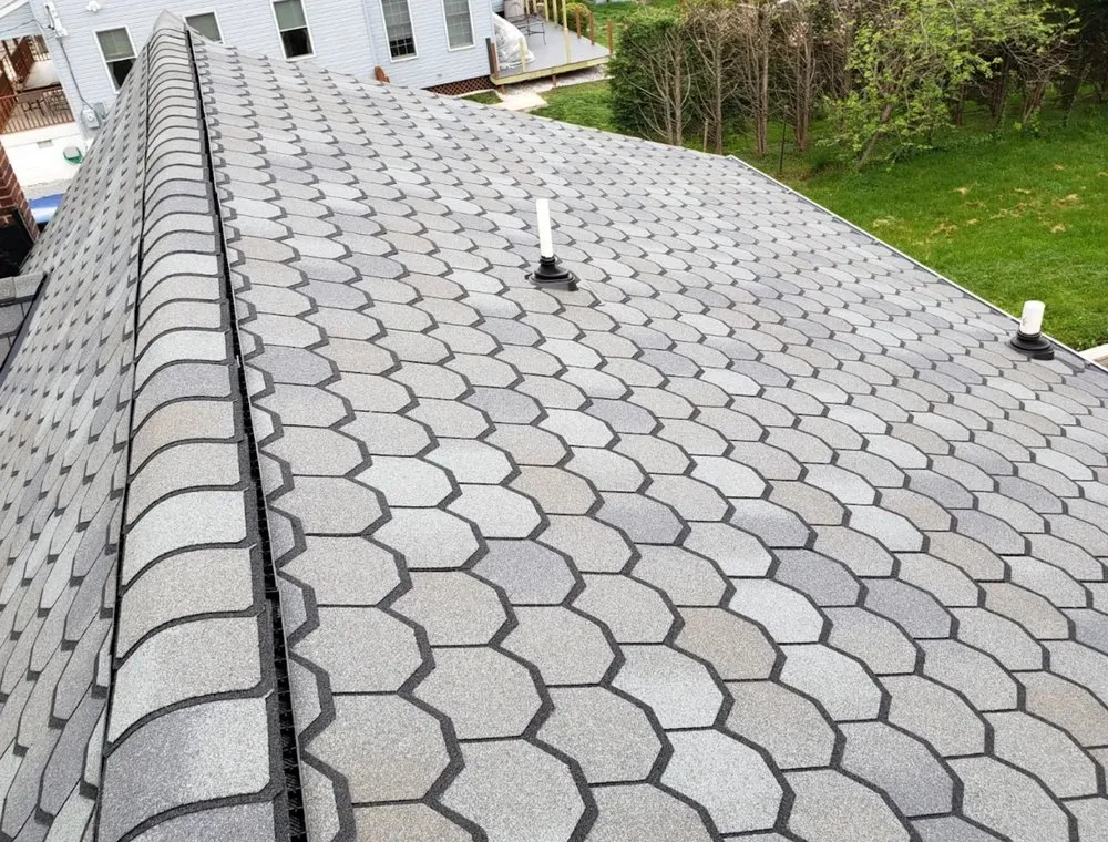 Slide of Elite Siding Gutters Roofing