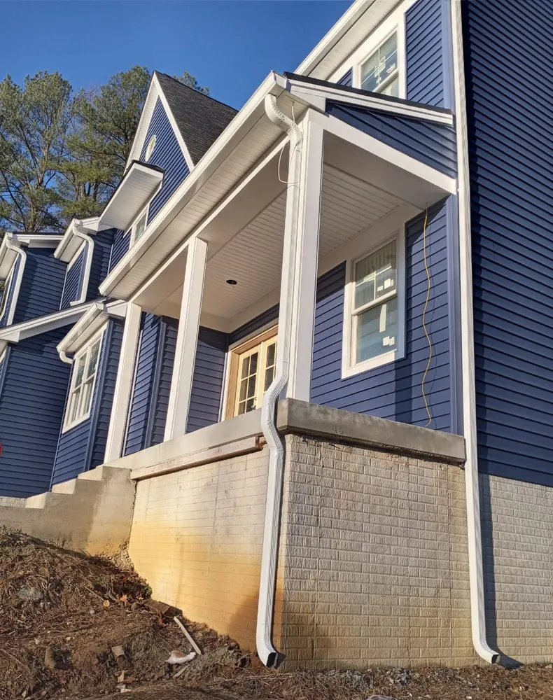 Slide of Elite Siding Gutters Roofing