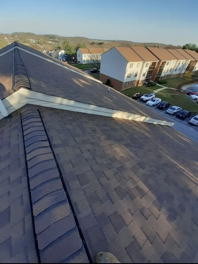 Slide of Elite Siding Gutters Roofing