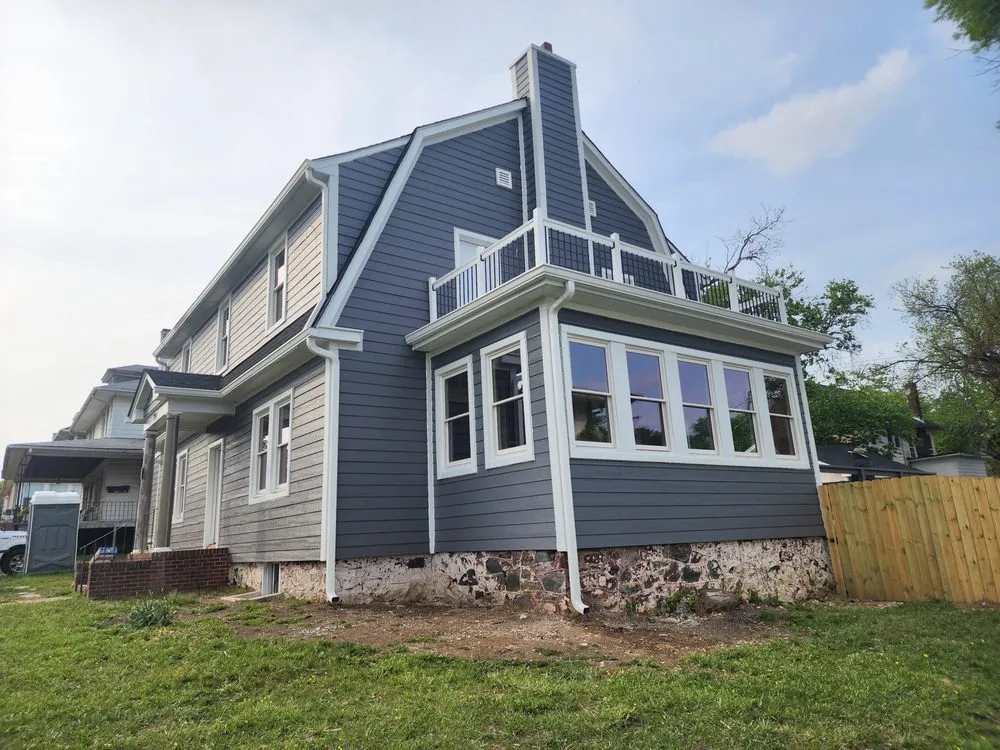 Slide of Elite Siding Gutters Roofing