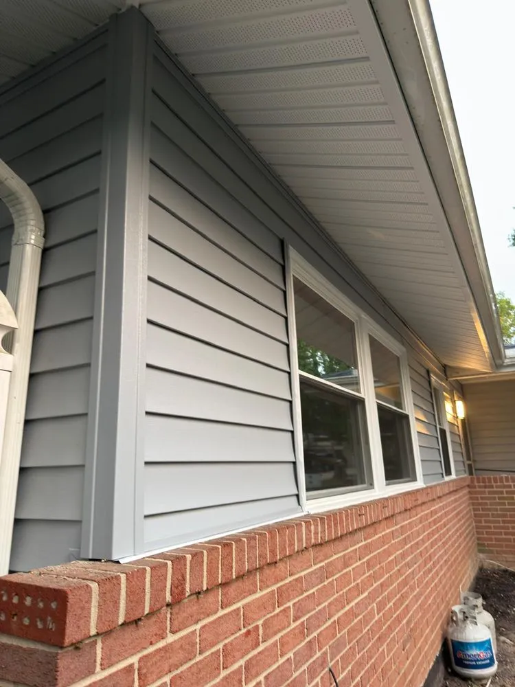 Slide of Elite Siding Gutters Roofing