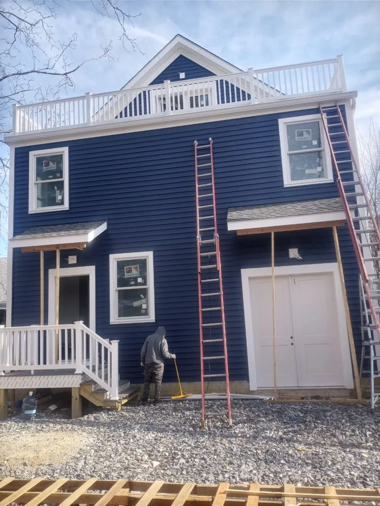 Slide of Elite Siding Gutters Roofing