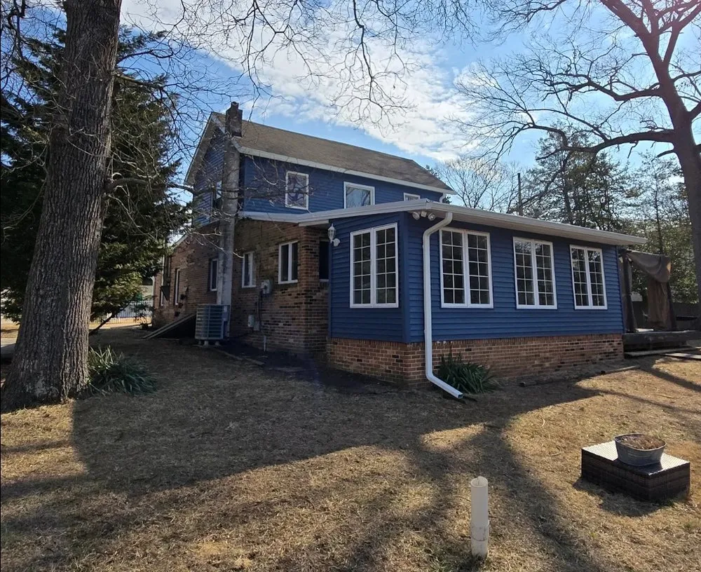 Slide of Elite Siding Gutters Roofing