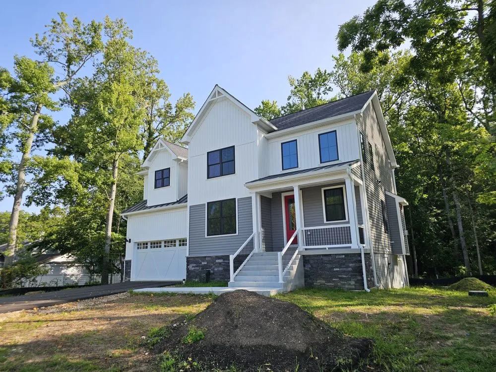 Slide of Elite Siding Gutters Roofing