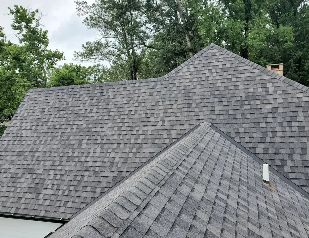 Slide of Elite Siding Gutters Roofing